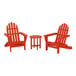 A group of red POLYWOOD Adirondack chairs and table.