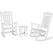 A white POLYWOOD rocking chair with a round side table.