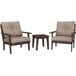 A POLYWOOD brown Lakeside table and chairs set with cushions.