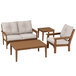 A POLYWOOD teak and burlap patio set with chairs and small tables.