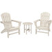 A group of three white POLYWOOD Nautical Adirondack chairs and a round table.