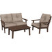 A POLYWOOD mahogany deep seating patio set with a chair, loveseat, and table.
