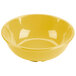 A yellow Thunder Group melamine salad bowl.