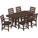 A POLYWOOD mahogany dining table and chairs set on an outdoor patio.