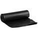 A roll of black Lavex Hercules trash bags.