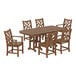 A POLYWOOD teak table with Chippendale style chairs.