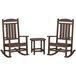 A POLYWOOD mahogany patio set with two rocking chairs and a table.