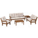 A POLYWOOD teak and dune burlap deep seating set with a table, settee, and chair.