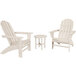 A group of white chairs and a small round table.