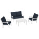 A white POLYWOOD deep seating set with blue cushions on a chair, settee, and table.