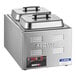 A stainless steel electric countertop food warmer with two covered pans and digital controls.