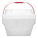 A large white foam cooler with a red handle.