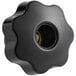 A black circular knob with a hole in it.