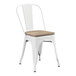A white Lancaster Table & Seating metal cafe chair with a gray wood seat.