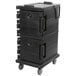 A black plastic Cambro Ultra Camcart for food pans on wheels.