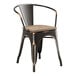 A Lancaster Table & Seating metal arm chair with a gray wood seat.