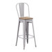 A Lancaster Table & Seating nickel gray metal barstool with a gray wood seat.