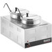 A silver Galaxy countertop food cooker with two inset pots on top of a metal surface.