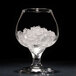 a glass with ice in it