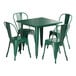 A Lancaster Table & Seating emerald green metal table with four chairs next to it.