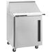 A silver Traulsen refrigerator with a right-hinged door.