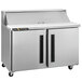 A silver Traulsen refrigerated counter with two left hinged doors.