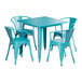 A turquoise square Lancaster Table & Seating outdoor table with four chairs around it.