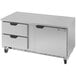 a white refrigerator with drawers