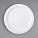 A white Fineline ReForm polypropylene plate with a white rim.