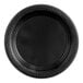 A black Fineline ReForm polypropylene plate with a black rim.