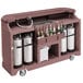 A white Cambro portable bar cart with a soda gun and 7 bottle speed rail.