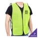 A man wearing a lime high visibility mesh safety vest.