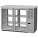 A stainless steel Beverage-Air back bar refrigerator with glass doors.