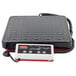 A black Rubbermaid digital receiving scale with a cord attached to it.
