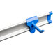 A Toolflex tool hook with a blue tool on it.