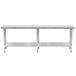 A long metal Advance Tabco work table with a galvanized undershelf.