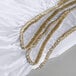 A white Oxford T180 king size fitted sheet with gold stitching.