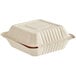 A white Footprint Bagasse take-out container with a lid.
