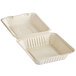 A white Footprint Bagasse take-out container with the lid open.