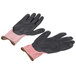 A pair of Cordova Machinist cut resistant gloves with black foam nitrile palms with black and red HPPE and glass fiber.