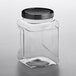 A clear plastic container with a black lid.