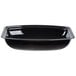 A black plastic Cambro rectangular ribbed bowl with a black lid.