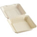 A white Footprint Bagasse take-out container with a lid open.