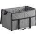 A grey insulated cooler bag with black straps.