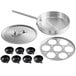 A stainless steel saute pan with 7 non-stick egg cups.