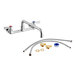 A chrome Regency wall mount faucet with parts.