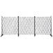 A black metal Versare Lock-N-Block collapsible security gate with wheels.