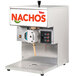 A Cretors nacho cheese pump machine with a white label on it.