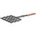 An Outset metal mesh grill basket with a wooden handle.