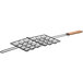 a black wire mesh grid with a wooden handle